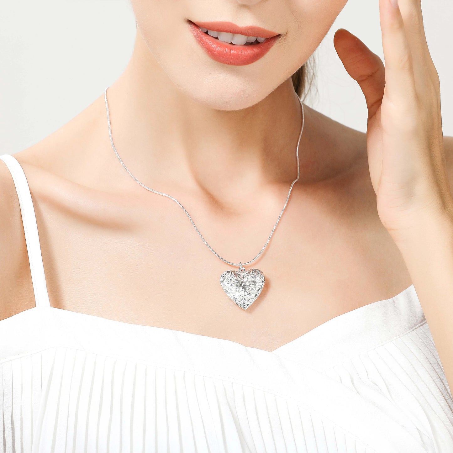 "Pendentif médaillon photo en forme de coeur"
